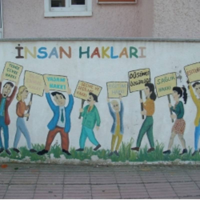 A mural describing human rights in Turkey outside of the public education building in Bayramic Turkey